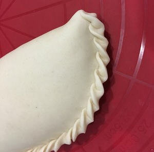 韭菜盒子的花边怎么捏？图解韭菜盒子花边包法5