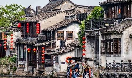 浙江古镇坐落在水网之中,沪杭铁路穿境而过,樱花三月热闹的水乡4