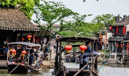 浙江古镇坐落在水网之中,沪杭铁路穿境而过,樱花三月热闹的水乡5